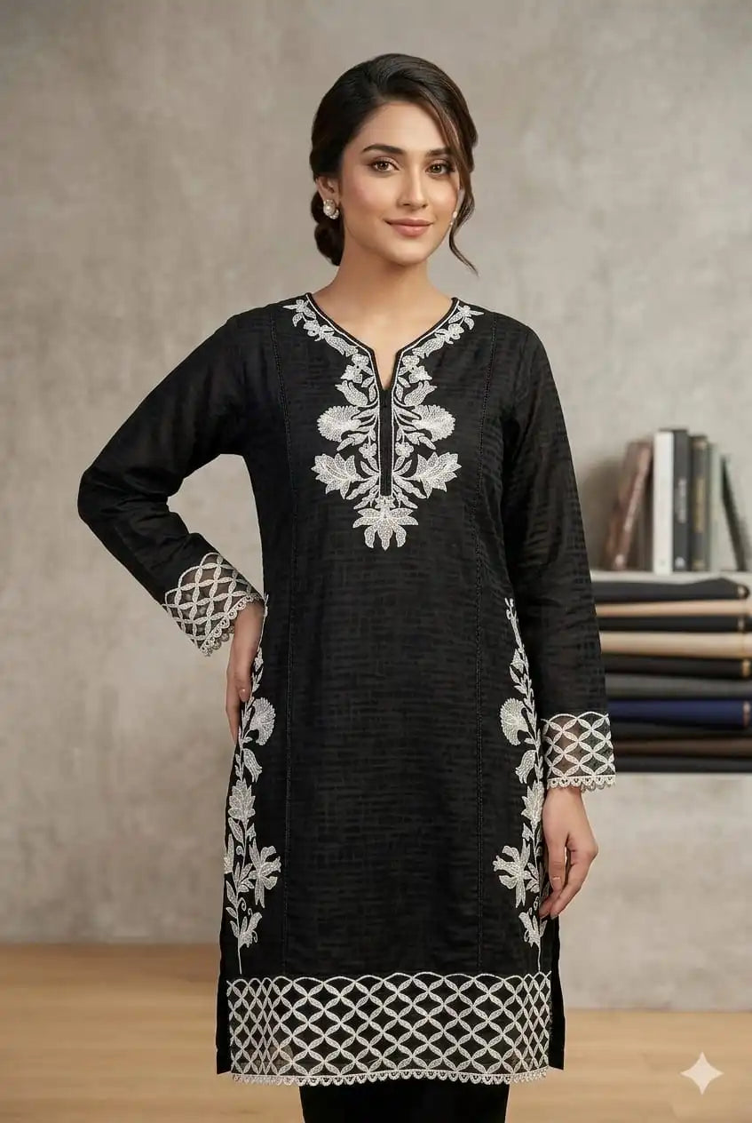 Black Orchid – Inspired by the delicate white floral embroidery against the deep black canvas.