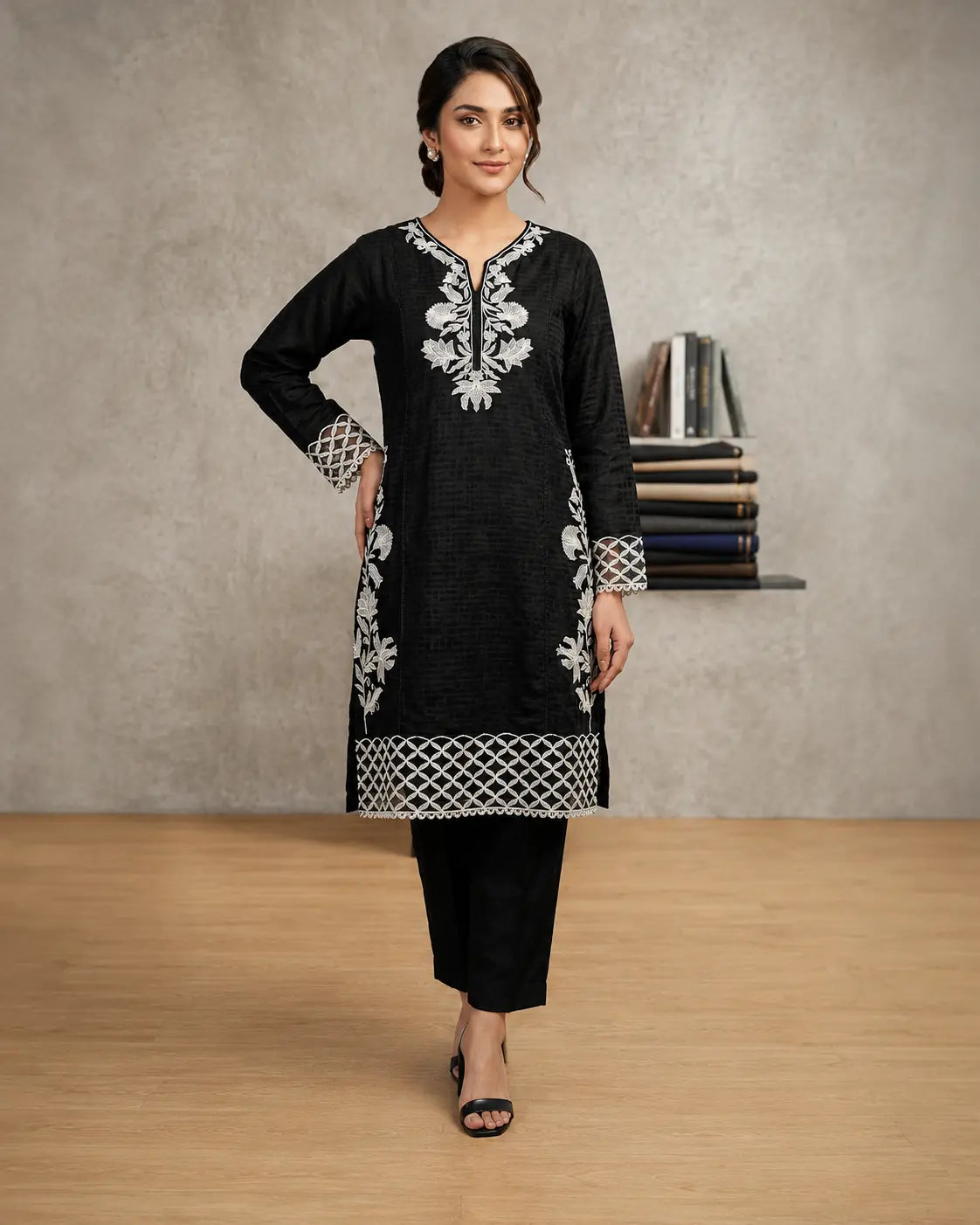 Black Orchid – Inspired by the delicate white floral embroidery against the deep black canvas.
